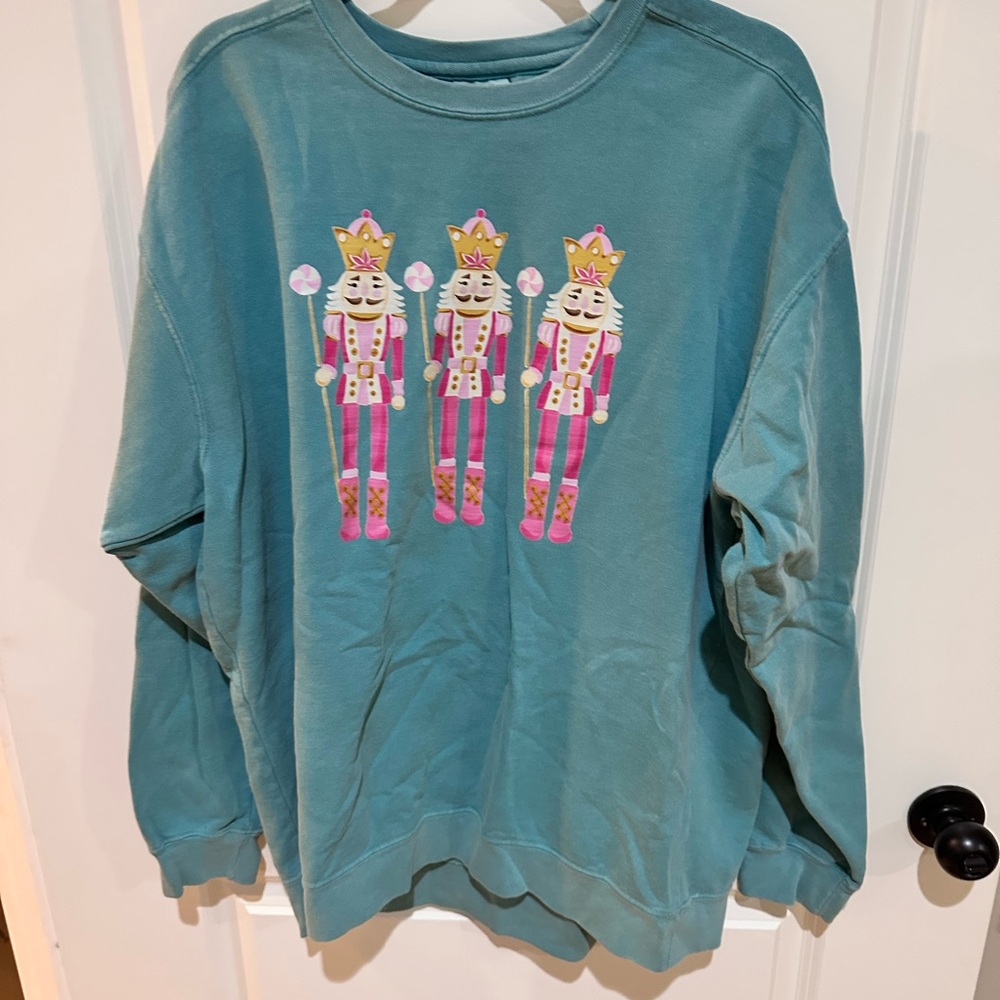 Teal Sweatshirt with Nutcracker Design
